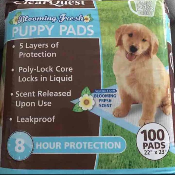 Brand new 100 count puppy dog pee pads - Picture 1 of 3
