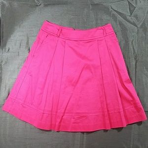 Pink pleated skirt with pockets