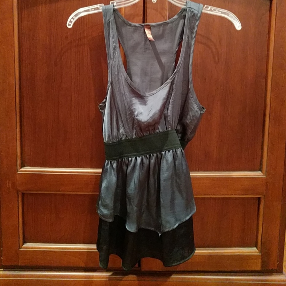 Boutique peplum racerback blouse