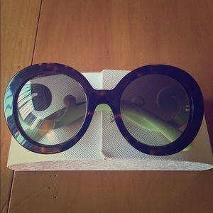 Tortoise and light green Prada baroque sunglasses