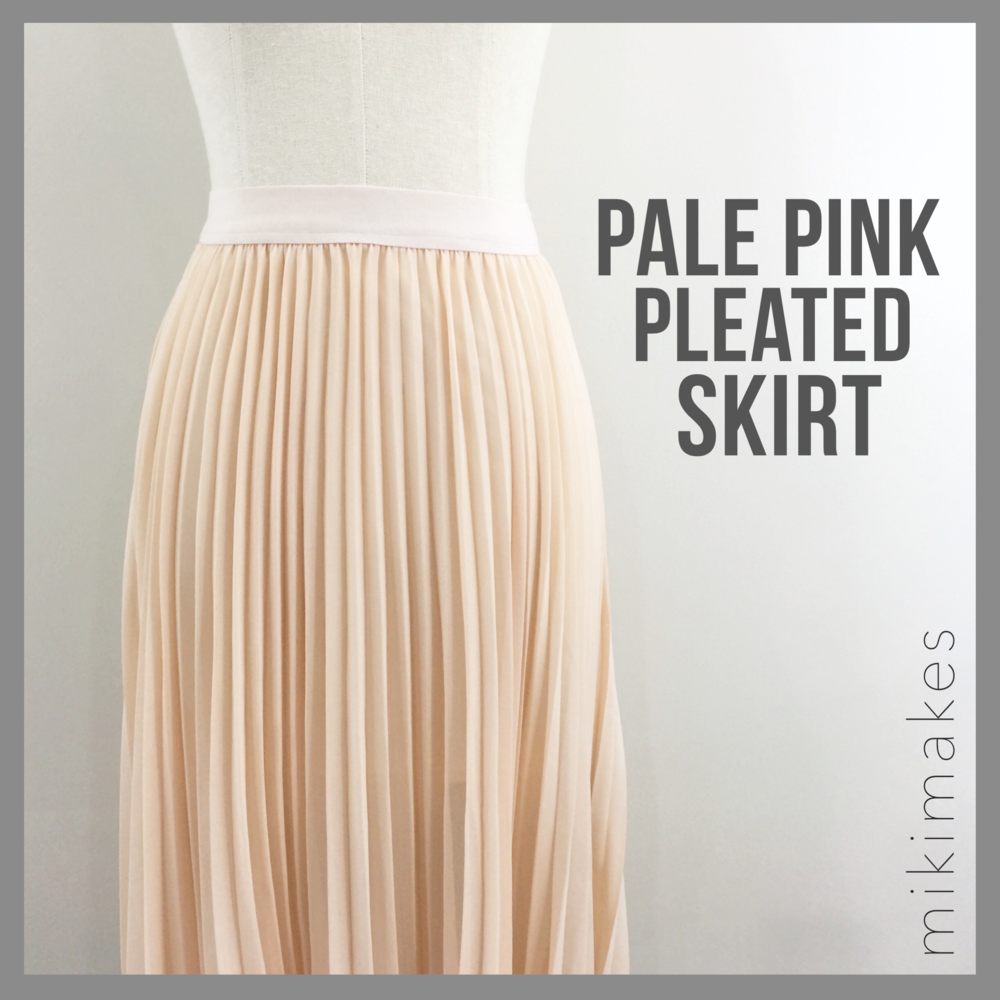 NWOT Pale pink pleated skirt knee length