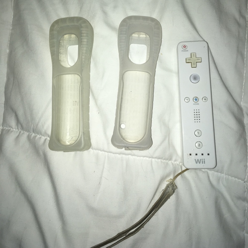 1 wii remote & 2 remote cases!