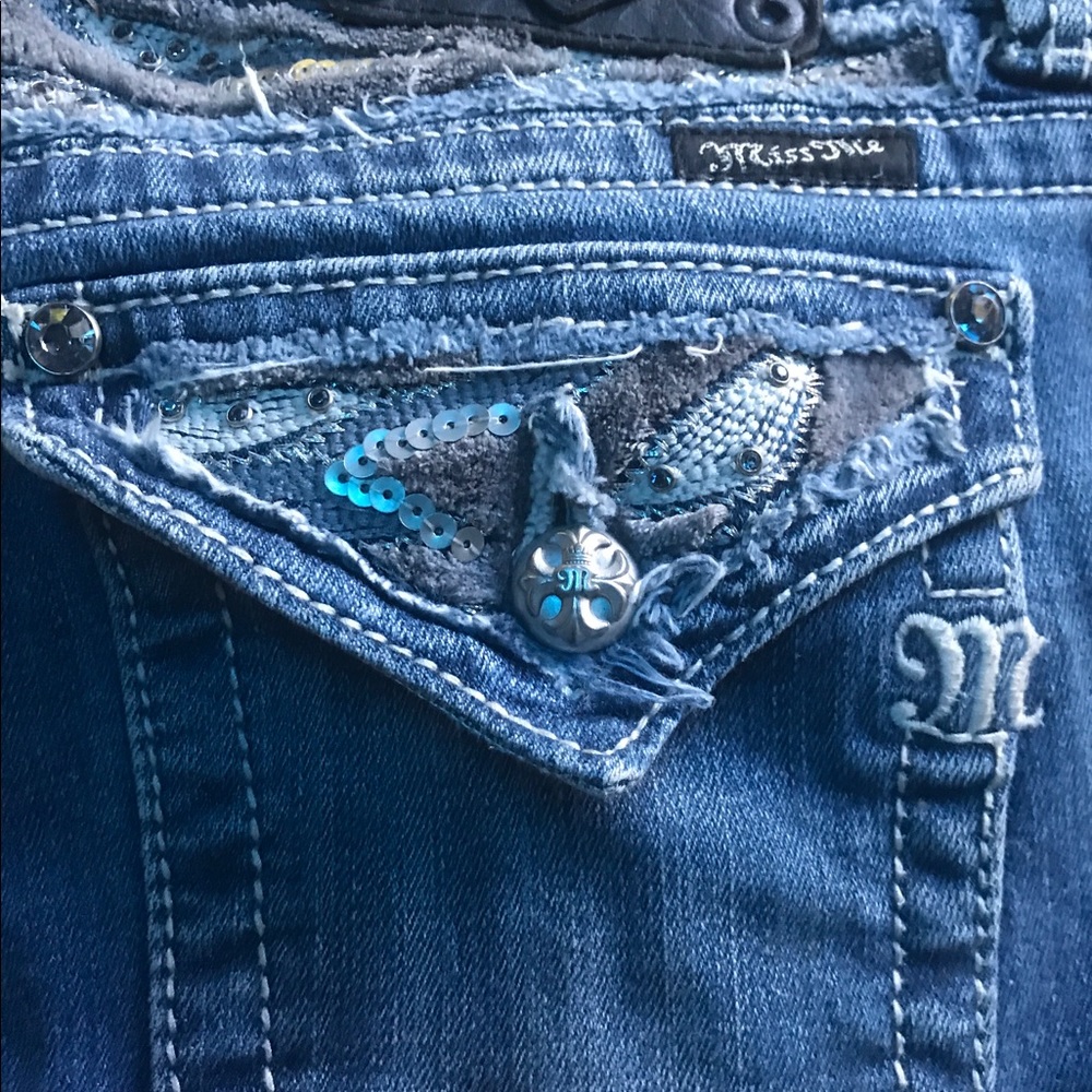 Miss Me med wash boot cut denim.