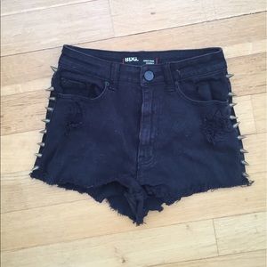 High waisted black studded jean shorts