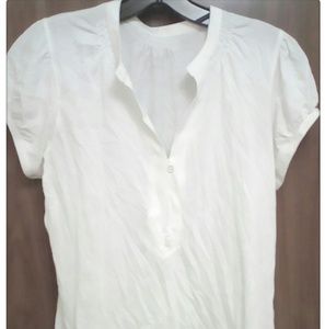 Ladies white t-shirt with ruffled shoulders-