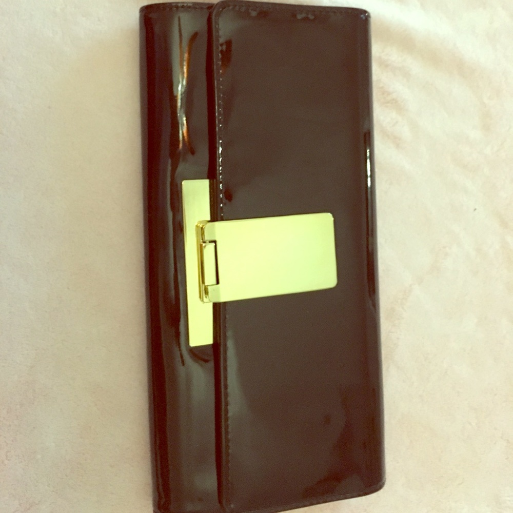 Aldo patent leather clutch