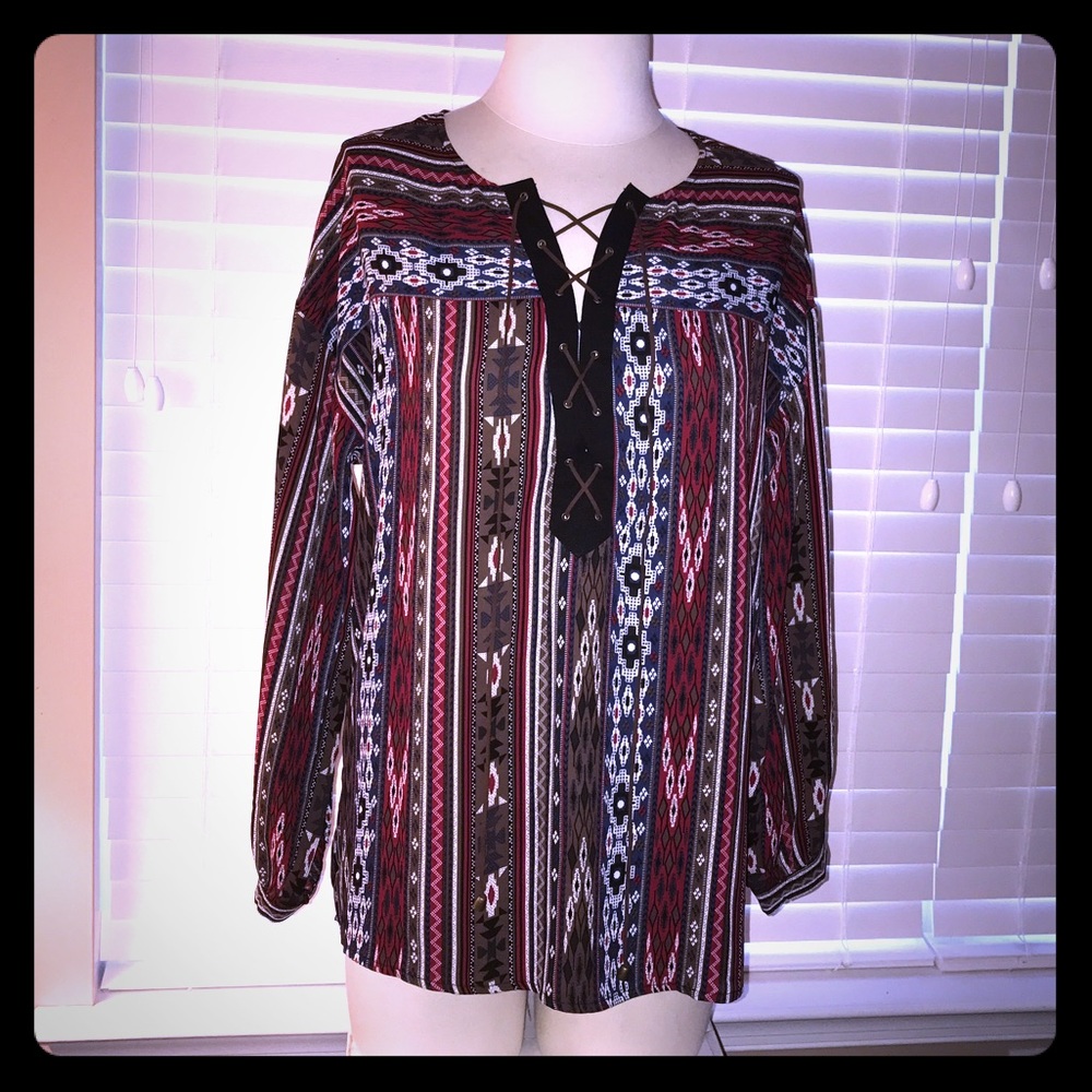 Burgundy tribal print lace up long sleeve top.