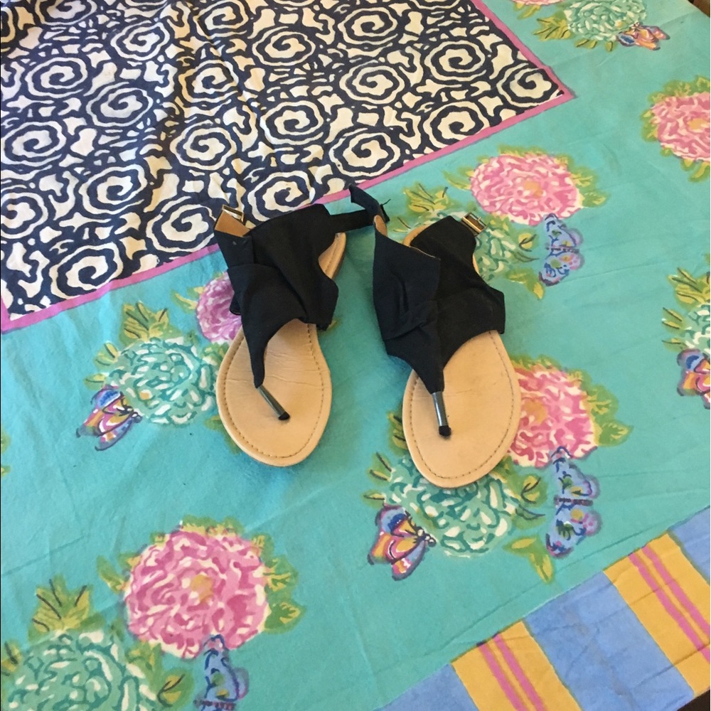 Black floppy sandals