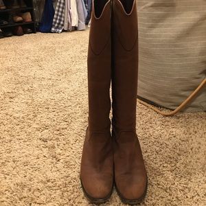 Chanel knee high leather boots.