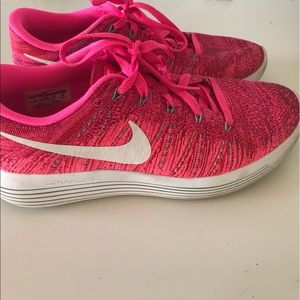 Pink Nike running shoes