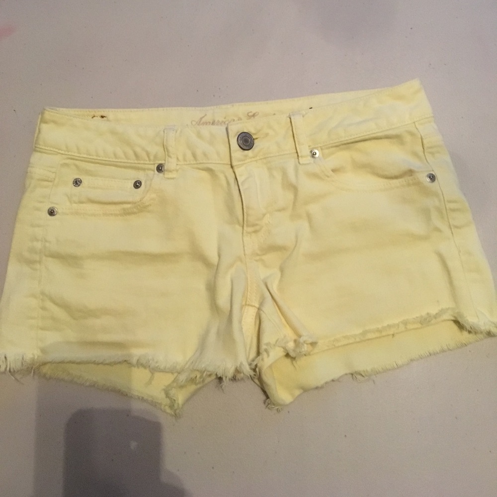 American Eagle yellow denim cut-offs. Size 8 midi