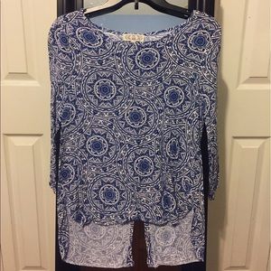 Long sleeve, high low shirt, with button up back