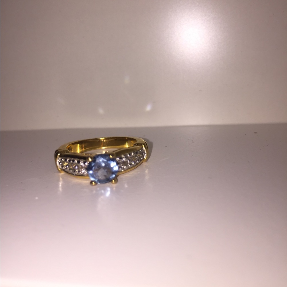 Costume blue topaz stone ring