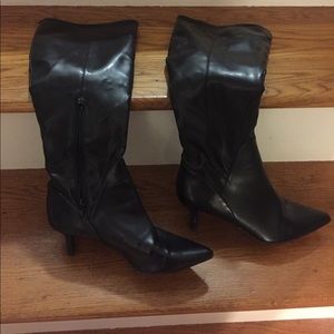 Black leather pointy toe knee high boots