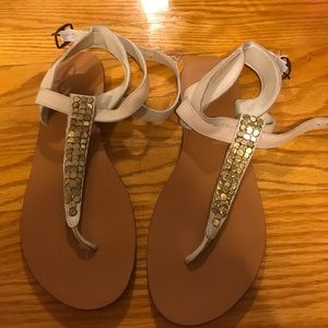 Tan and gold sandals