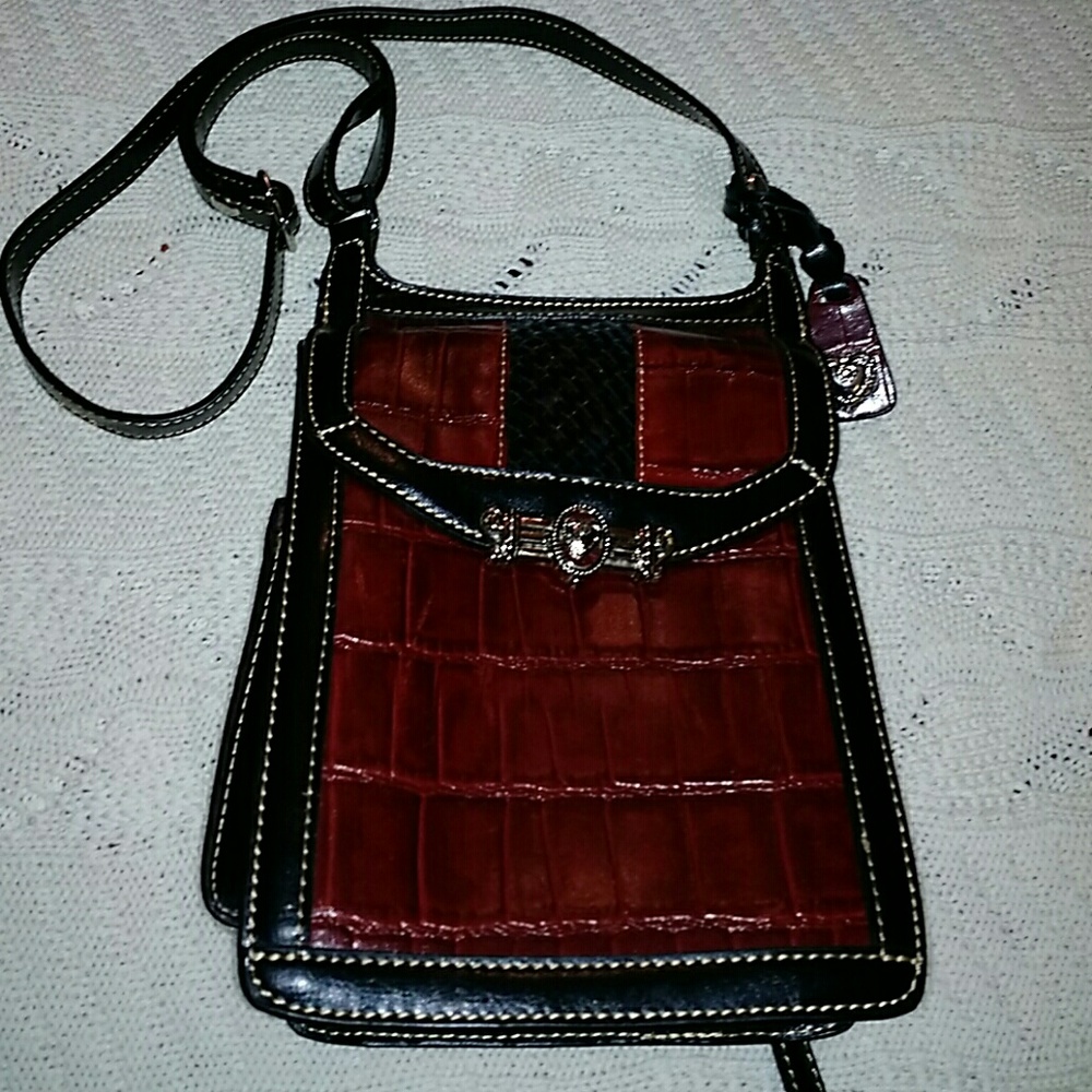 M. C. Cross body bag.
