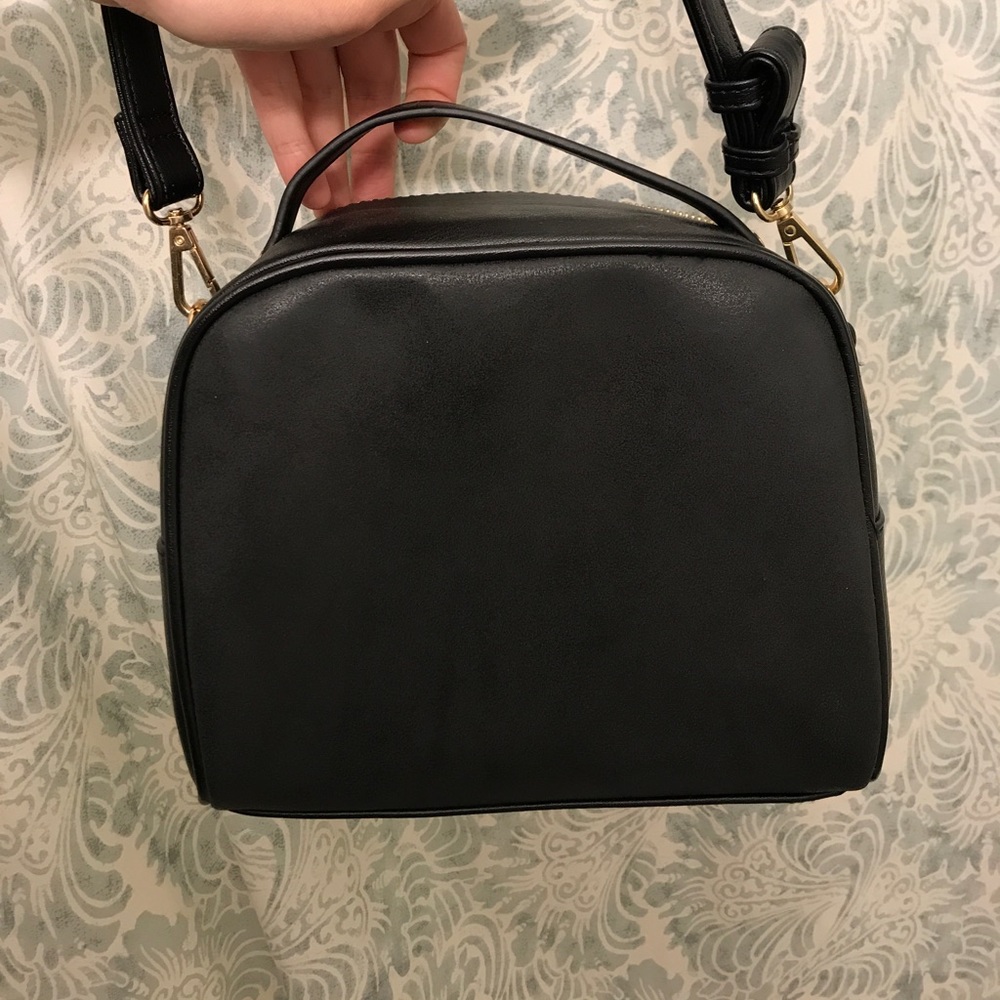 Selling this brand new edgy and stylish purse. - Picture 3 of 4