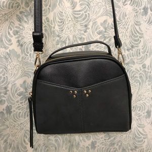 Selling this brand new edgy and stylish purse.