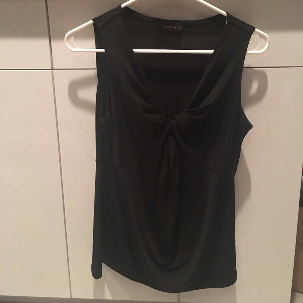 Women's sleeveless Black Top.