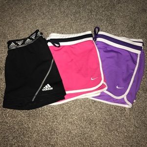 3 pairs workout shorts. 2 Nike 1 Adidas