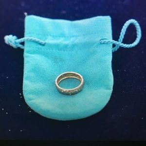 Gold ring with faux diamond studs - two studs out