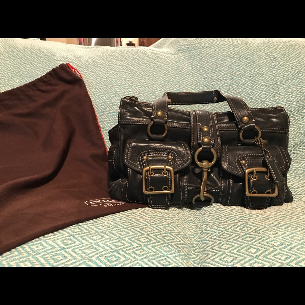 Very well taken care of authentic Coach Handbag.