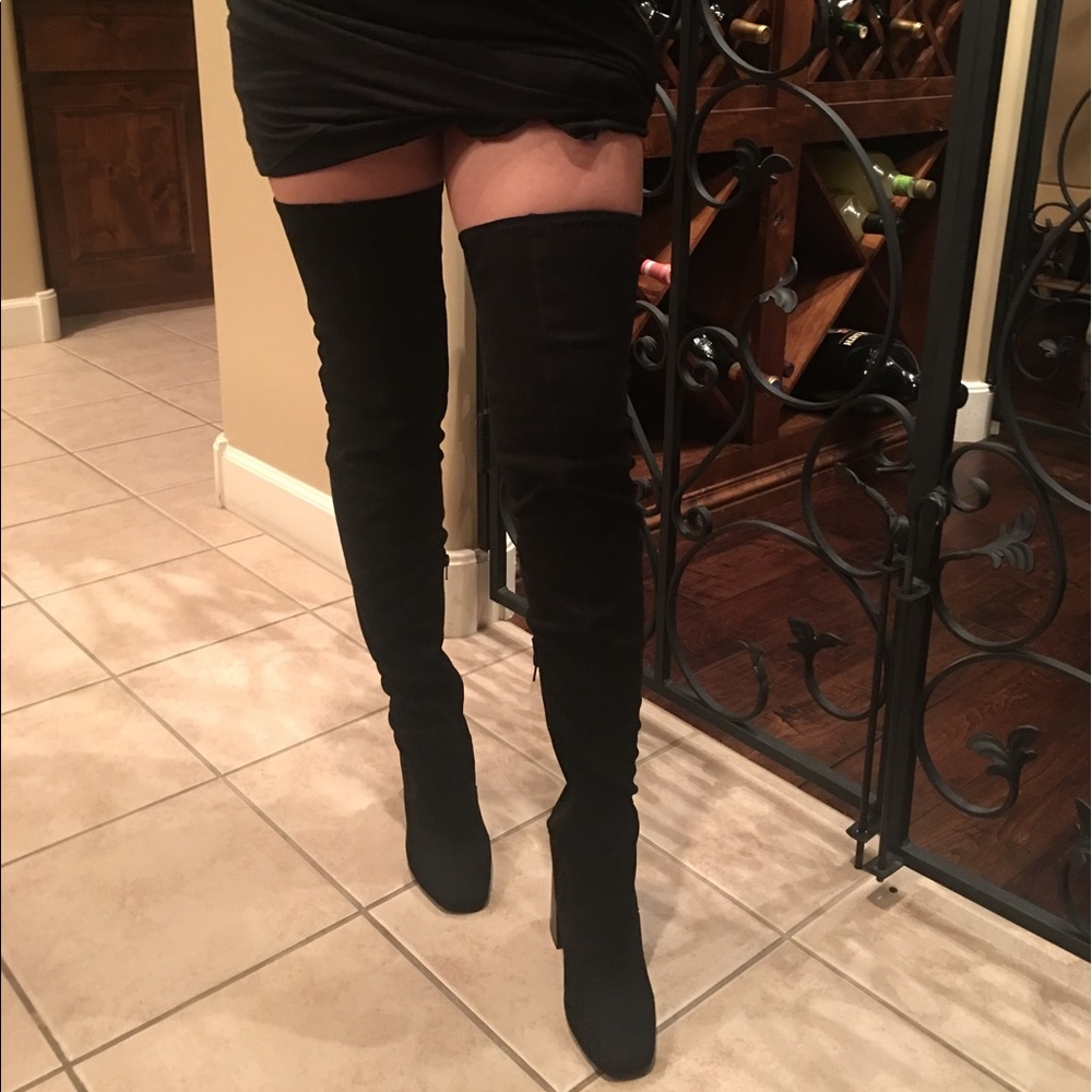 Thigh high black boots