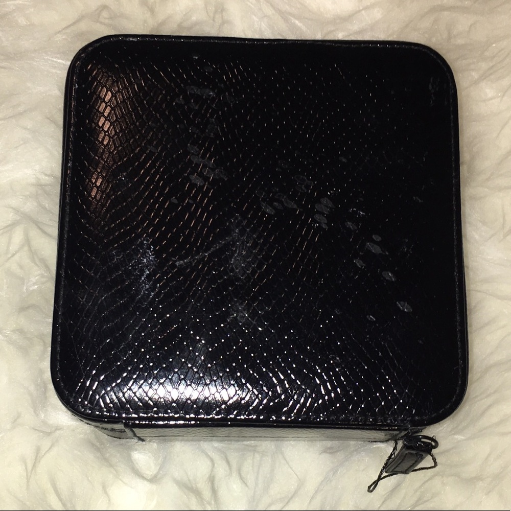 Black leather jewelry box.