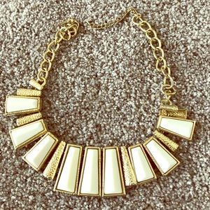 Gold and white necklace