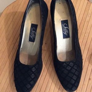Selby black dressy material pumps.