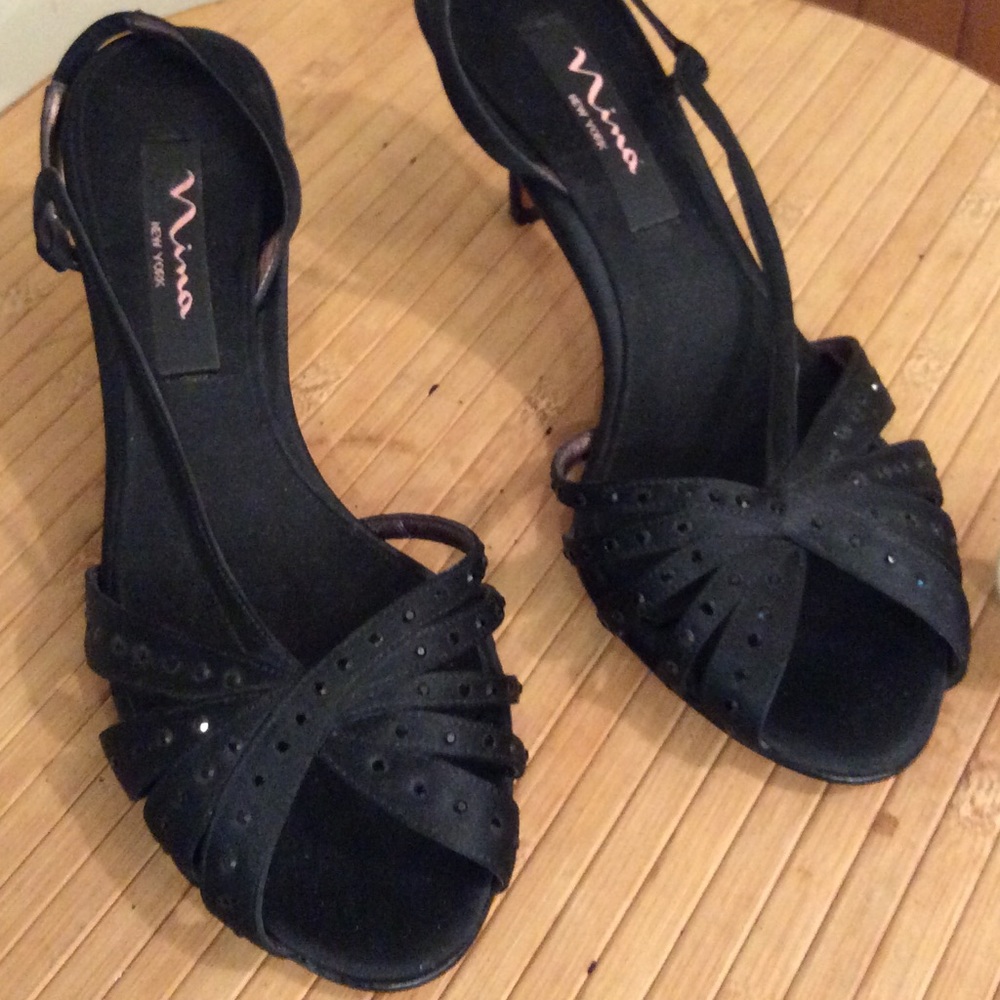 Pretty dress sandals with black sequins.