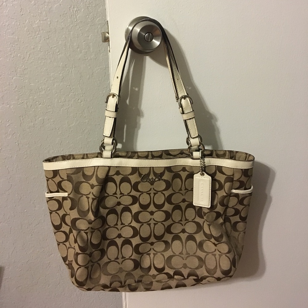 Coach bag / purse.. fancy beach bag use too!