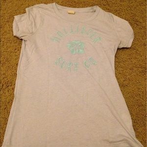 Cute grey shirt with a turquoise lettering