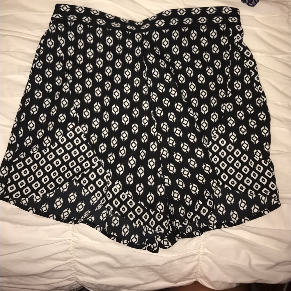 Flowy black and white designed shorts.