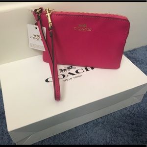 Authentic New Ruby pink coach wristlet ❤️