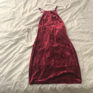 Cross back red velvet mini dress