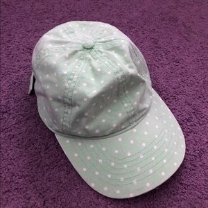 Mint green hat with white polka dots