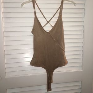Tan body suit