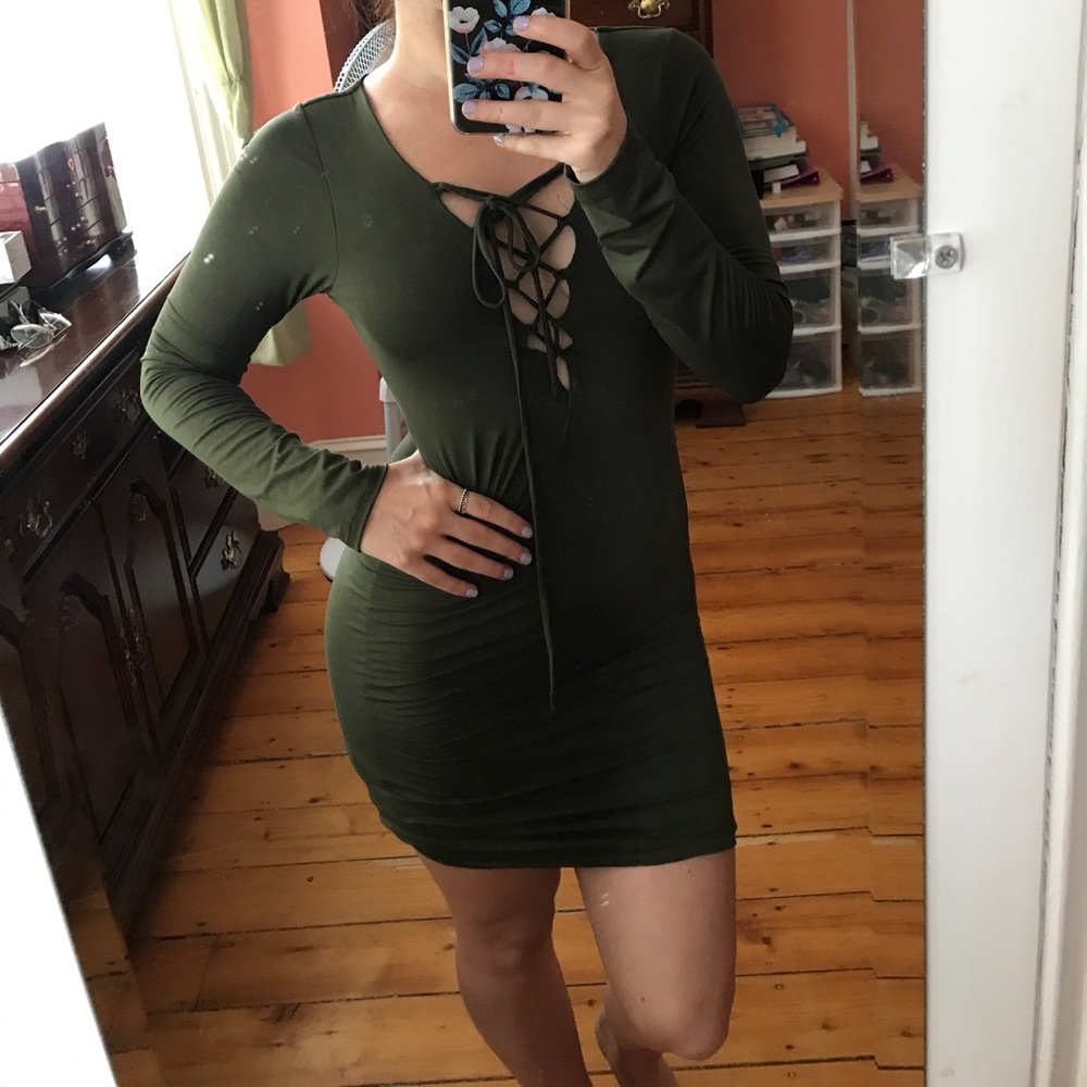 Green body con lace up dress NWT