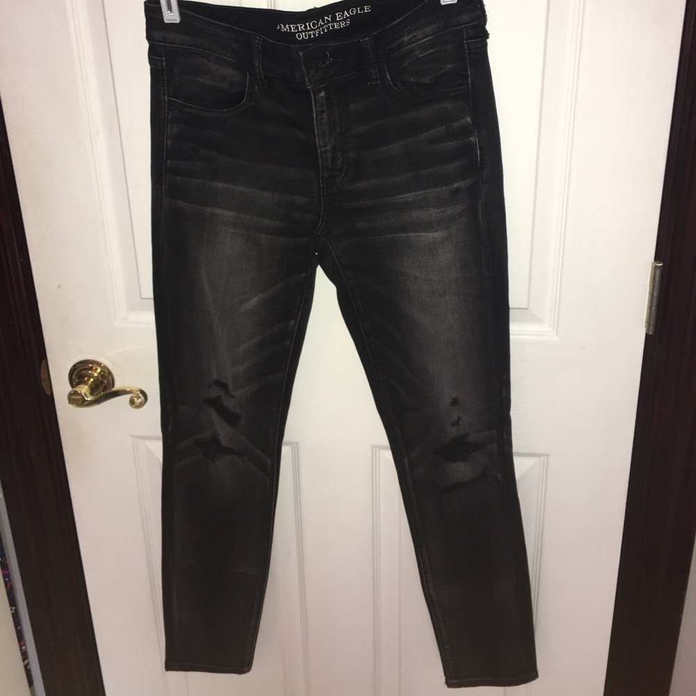 Black jeggins with rips on them