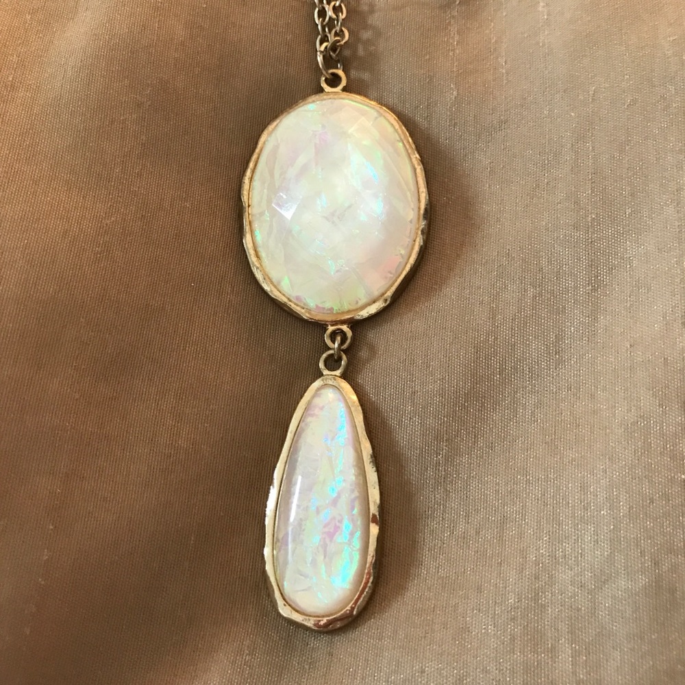 Long gold pendant necklace with iridescent stones