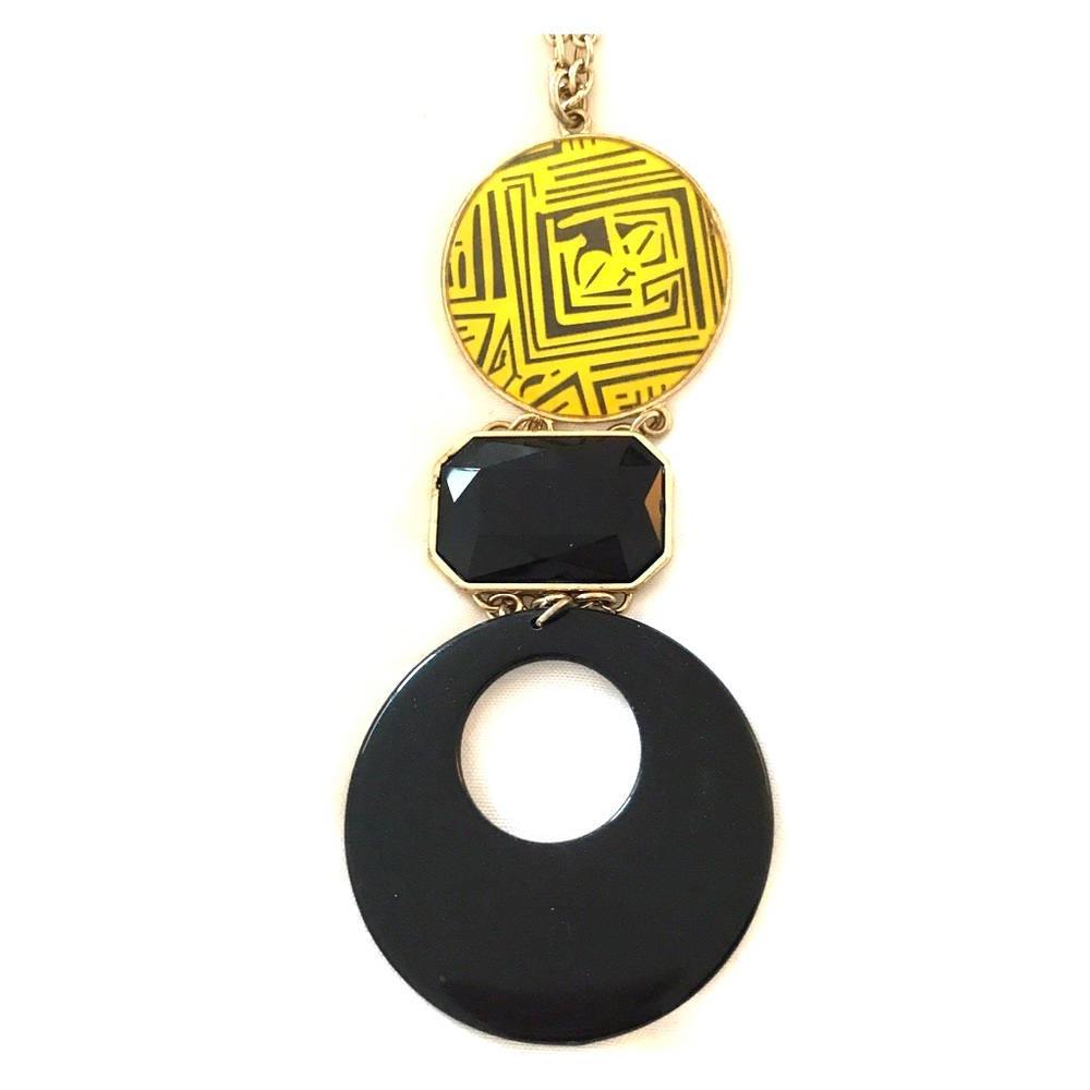 Long black, yellow, and gold pendant necklace