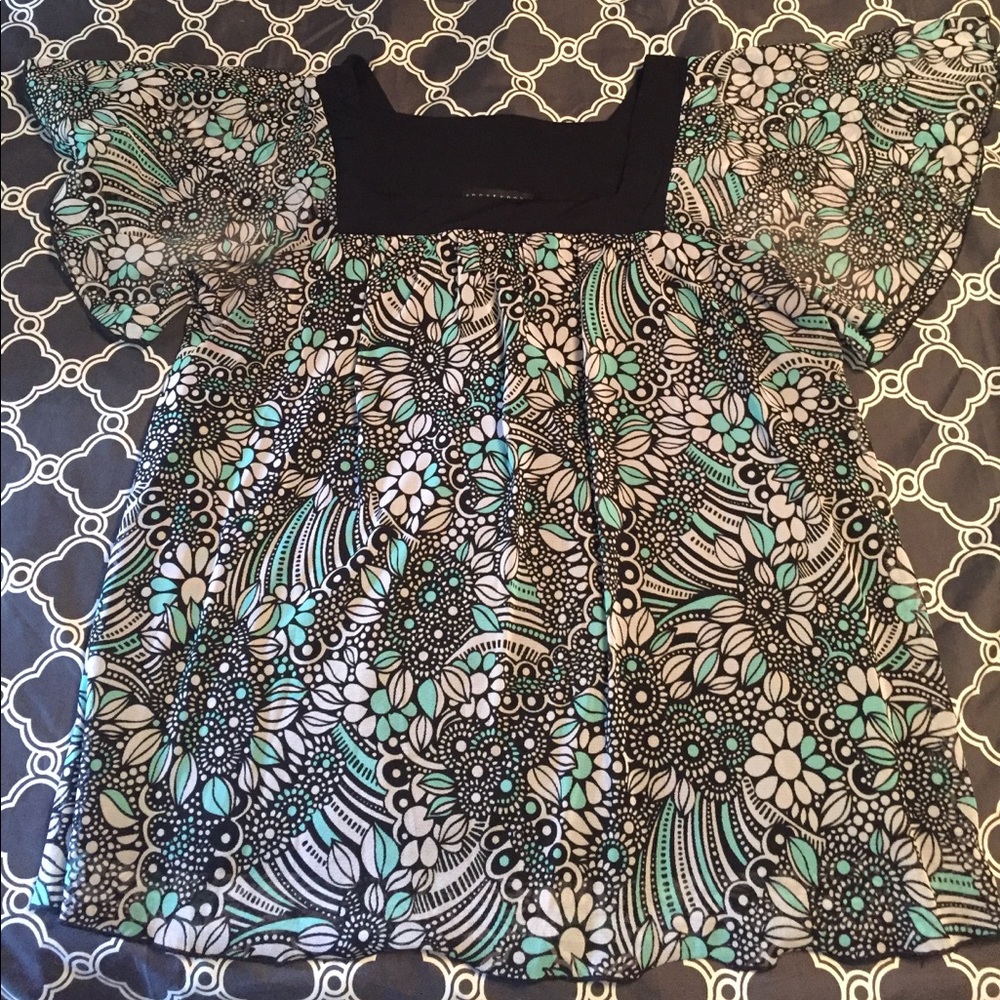 Cute sheer shirt with lining.