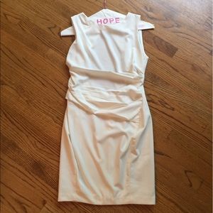 Cream dress with cut out back