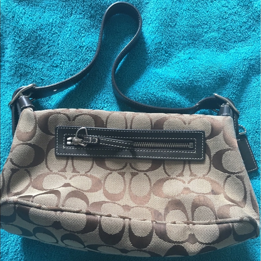 Small Brown Coach shoulder purse.