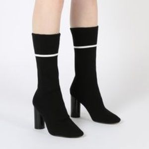 Heeled sock boot
