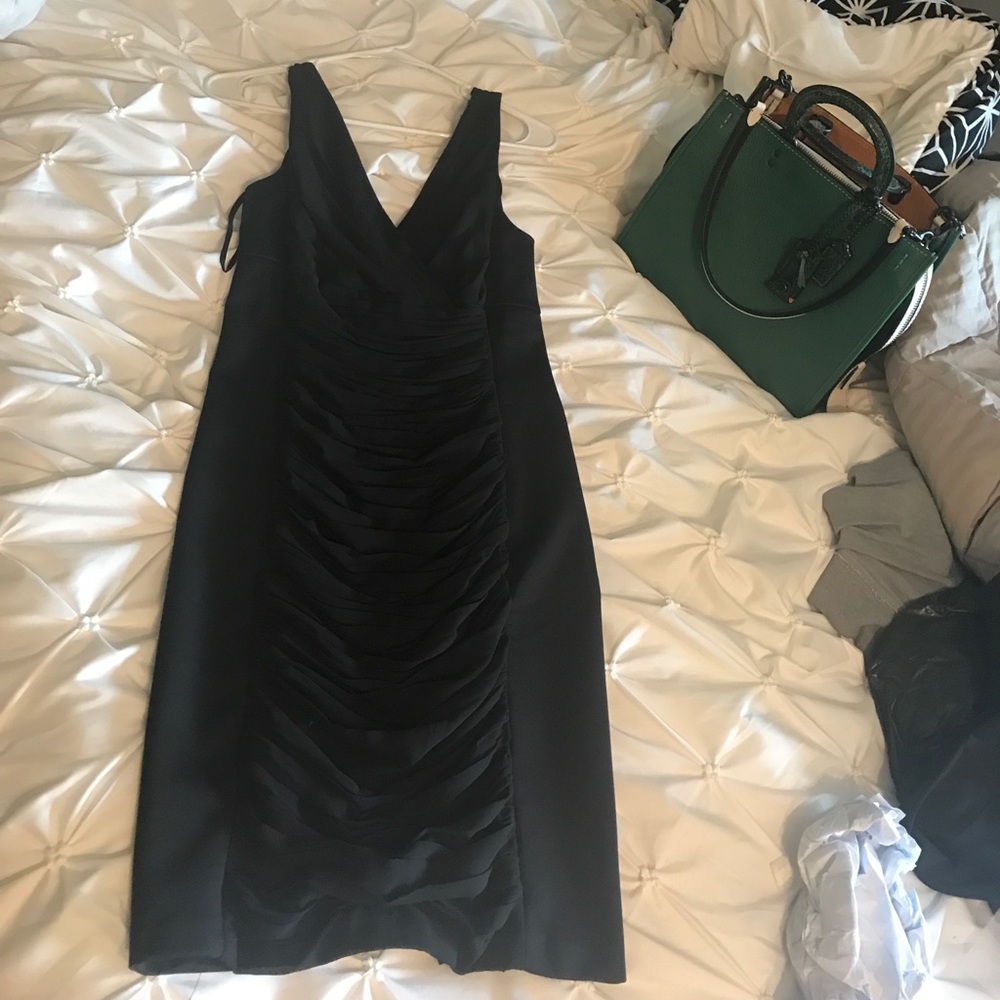 WHBM black dress with ruching detail down center.