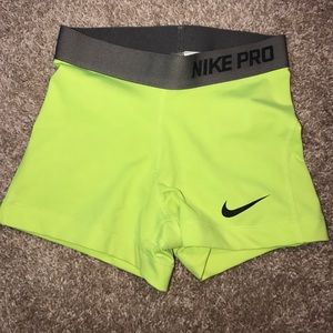 neon yellow Nike Pros