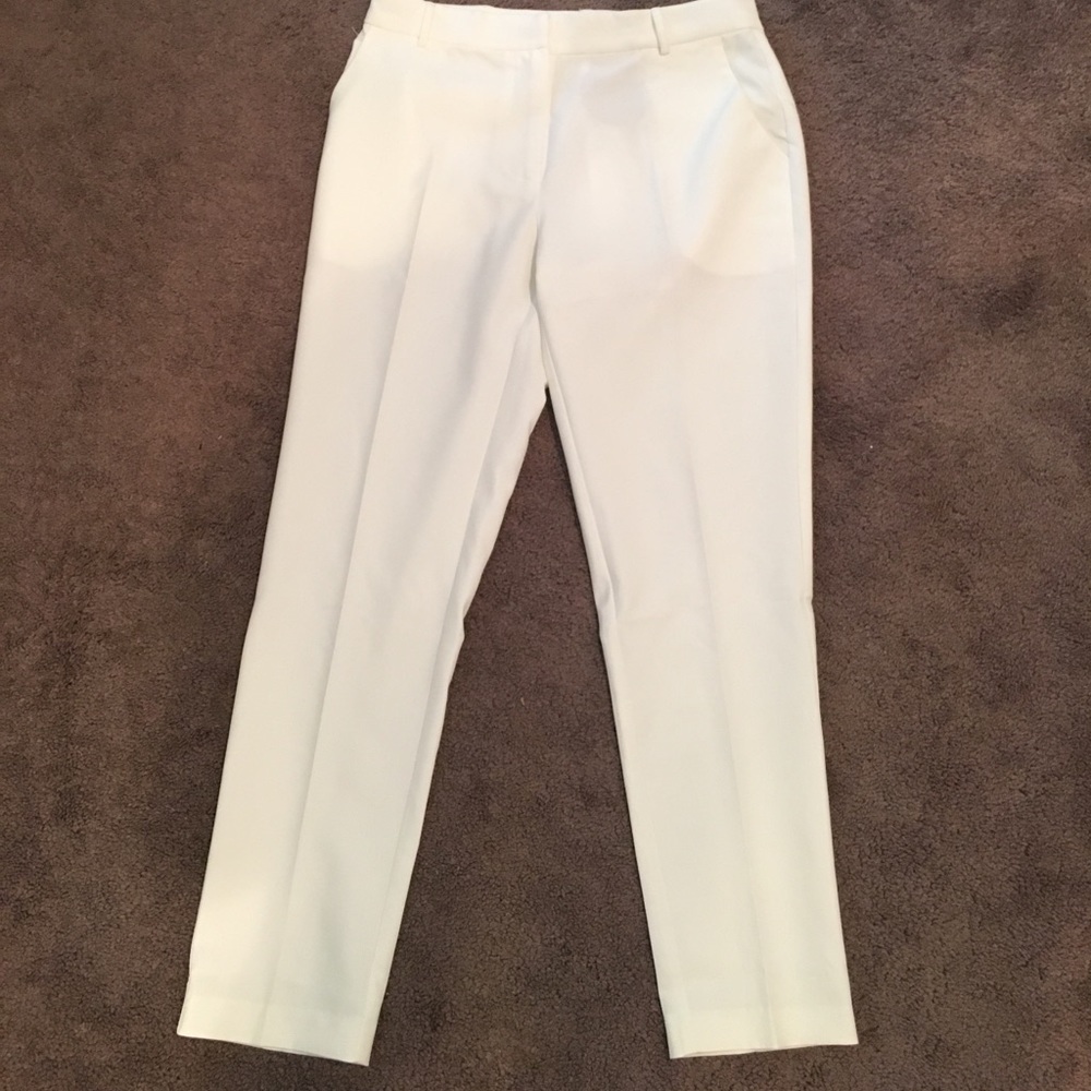 Ankle length white trousers