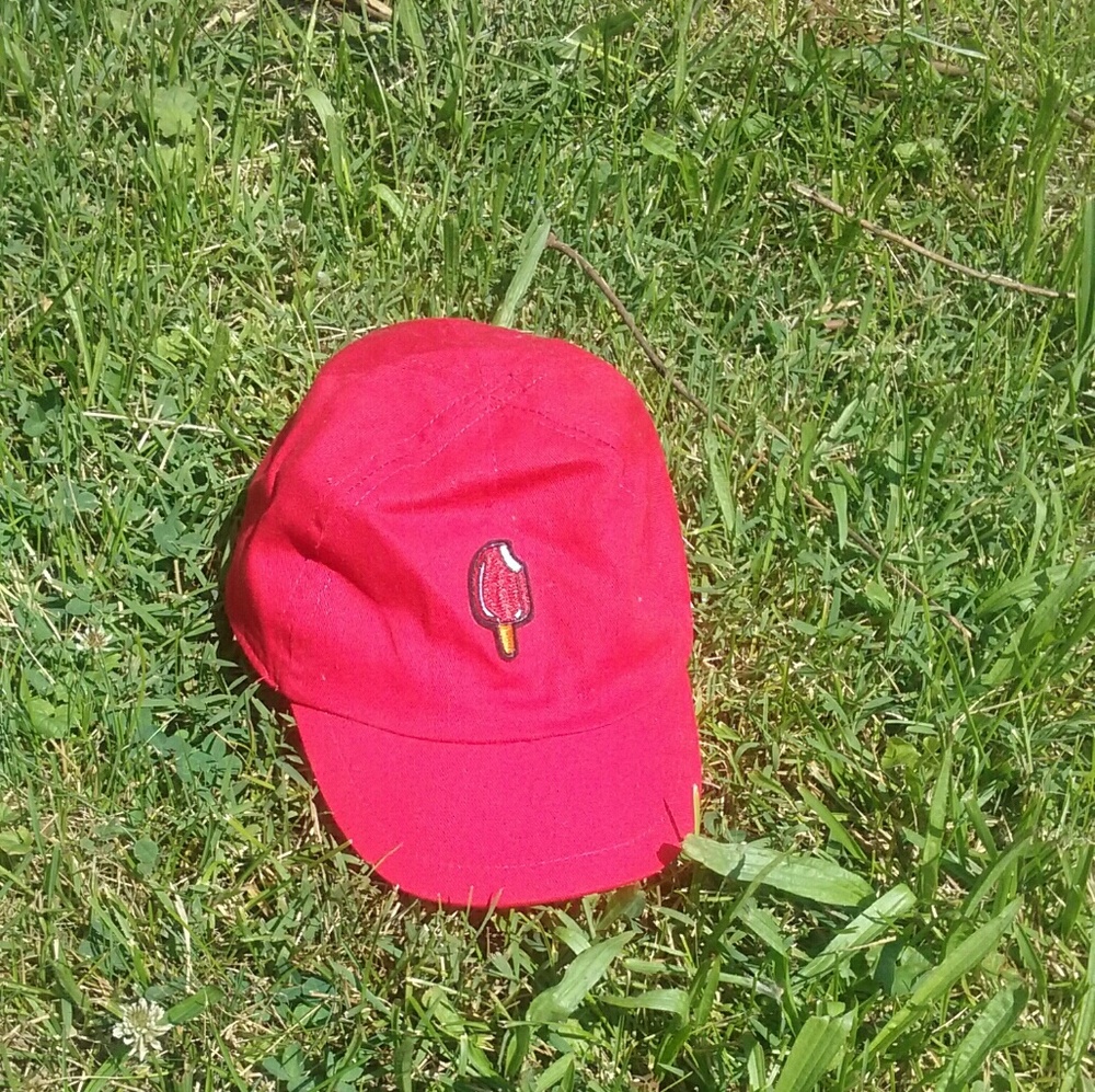 Red kids hat with popsickle patch on it